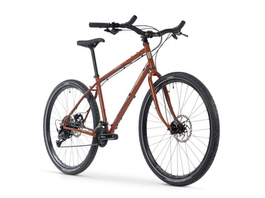 Boreal | All Terrain Touring Bike in rust with durable frame, disc brakes, and all-terrain tires on white background