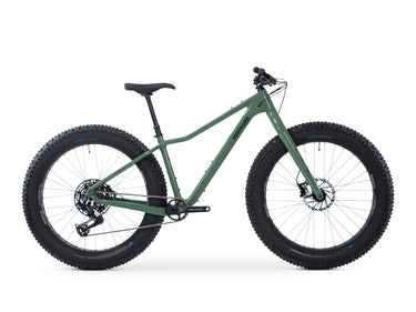 Side view of Chic-Chocs 3 | Carbon Fat Bike with knobby tires and lightweight frame on a white background